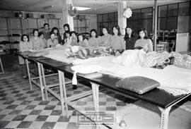 Trabajadoras en taller de costura – Foto 3